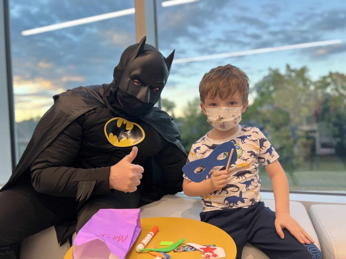 Image from Moments of Joy - Boy in a picture with Batman