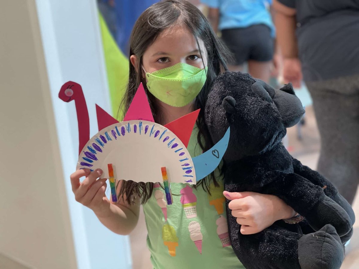 Image from Family Fun Nights - Girl with a hand craft dinosaur