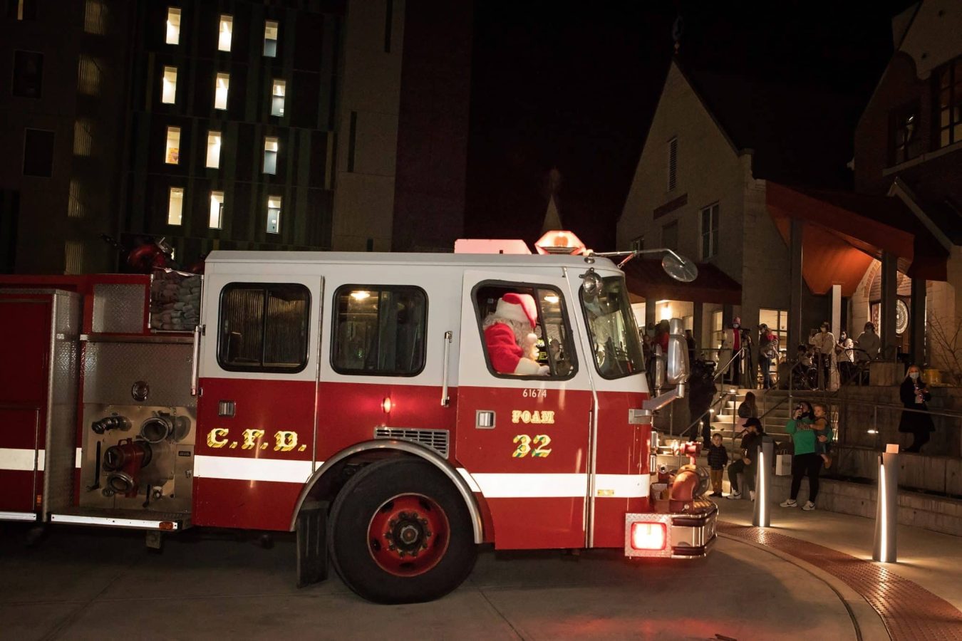 Image from Comfort and Joy - Santa inside a firetruck