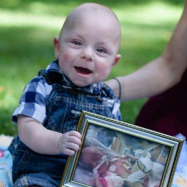 Image of Kasey holding a picture